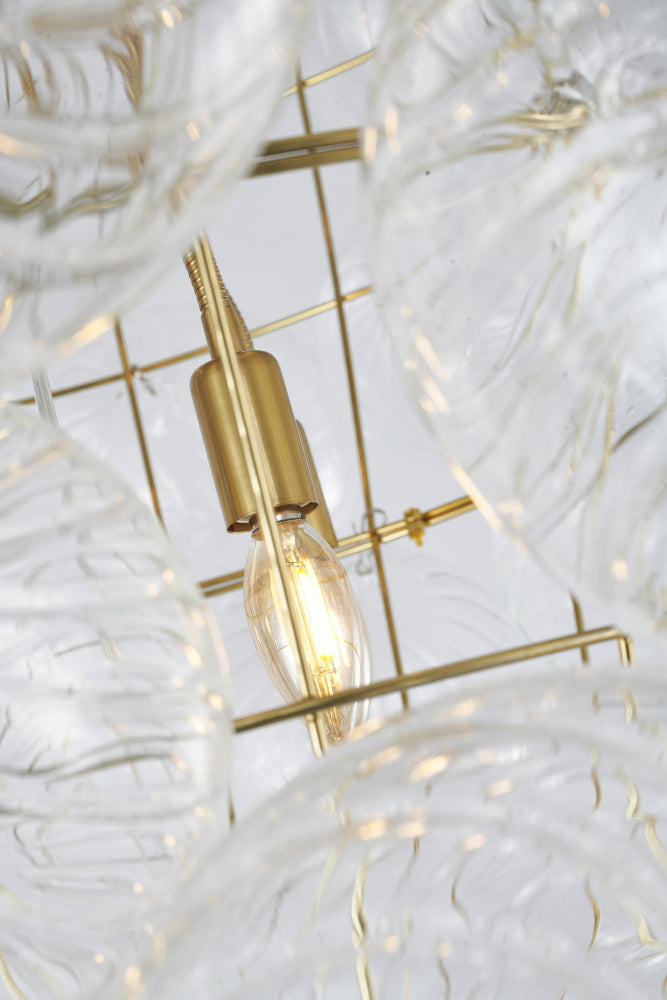 Brass Frame Chandelier featuring Clear Swirl Glass Shades