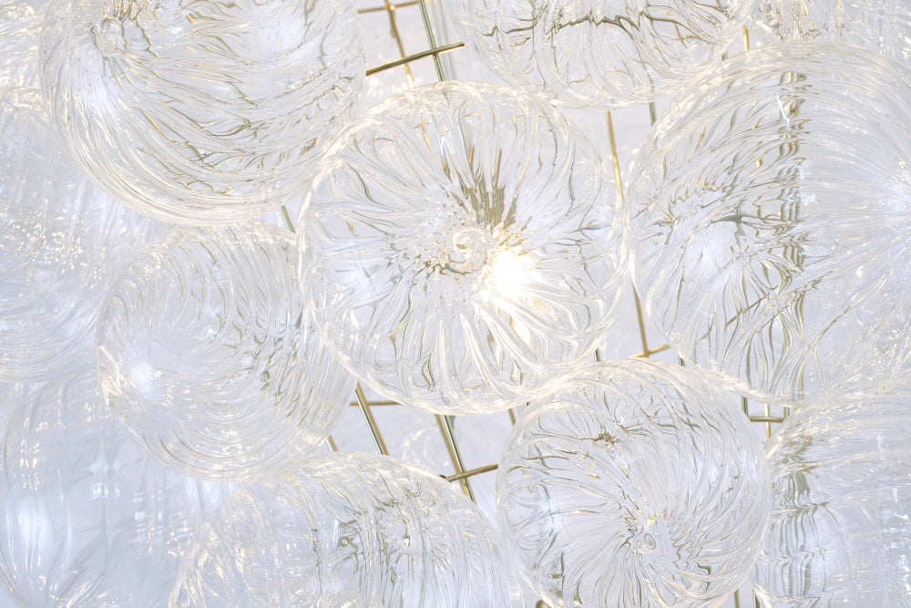 Brass Frame Chandelier featuring Clear Swirl Glass Shades