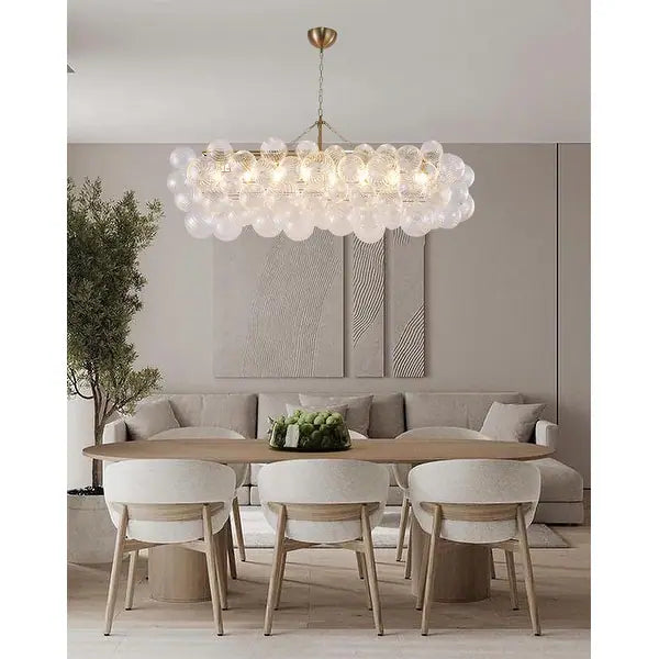 Brass Frame Chandelier featuring Clear Glass Swirl Shades
