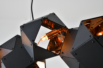 Black Block Framed Chandelier With A Reflective Copper Interior